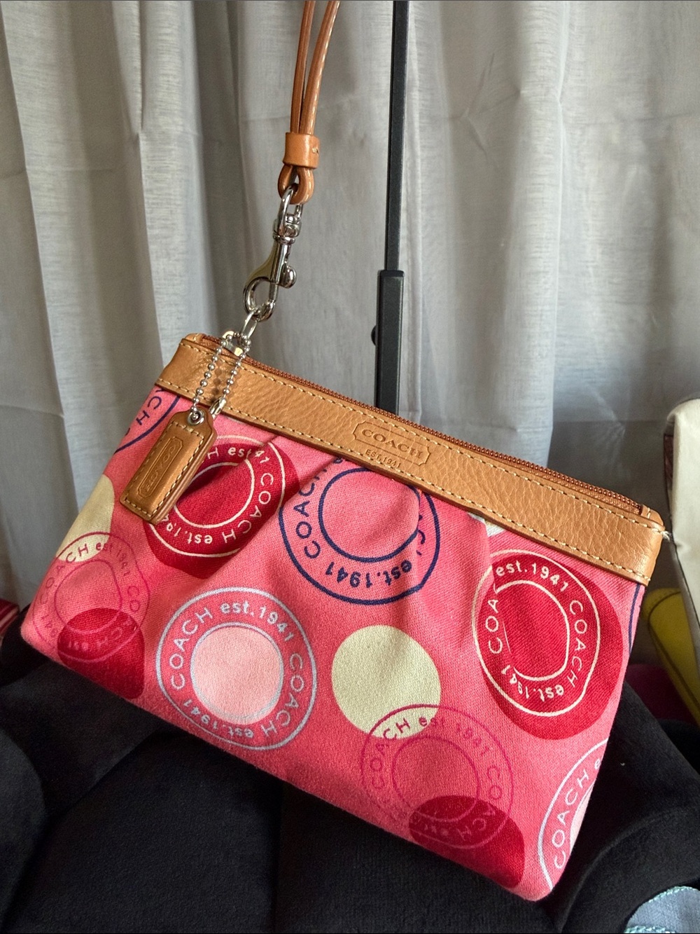 Coach “Passport Stamp” Print Wristlet with Tan Trim